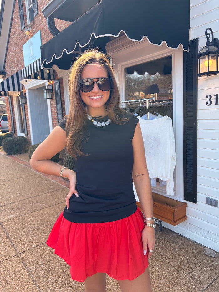 black gathered top