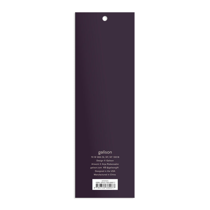The back cover of a rectangular, vertical Cottage Cats Magnetic Bookmarks by Anja Riebensahm is dark purple with white text detailing the company’s address, design, manufacturing info, and website at the bottom.