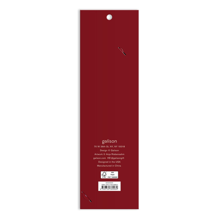 The image shows the back of a tall, rectangular, dark red Cottage Cats Paper Bookmark package by Anja Riebensahm with white text displaying company info, a New York address, manufacturing details, and a small recycling symbol at the bottom.