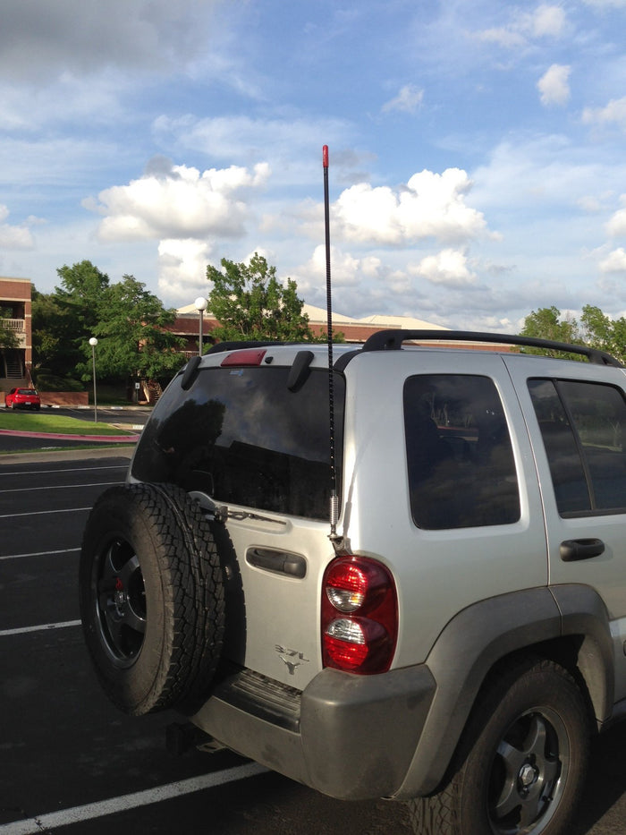 Firestik Door Jamb CB Antenna Mount Installed Over Tail Light on Jeep