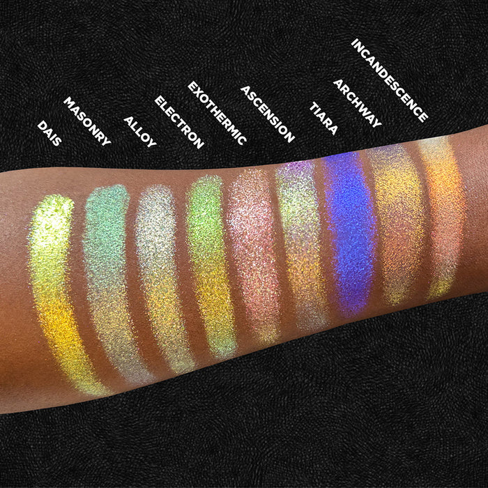 Arm swatches of Electron and the rest of the Stained Glass Expansion Bundle on deep skin tone, on a black background.