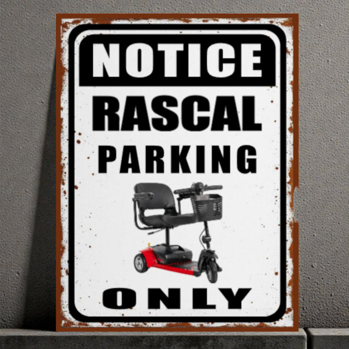 Metal sign with a scooter and text 'Notice Rascal Parking Only' on a gray background