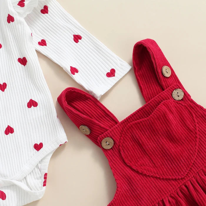 2-Piece Baby Girl Outfit – Heart Print Ruffle Romper & Suspender Skirt Set (0–18M)