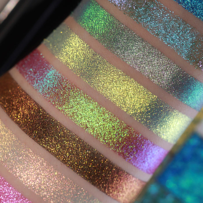 Close up shot of Aureate as well as 6 other Holiday Countdown Box shadows on fair skin tone.