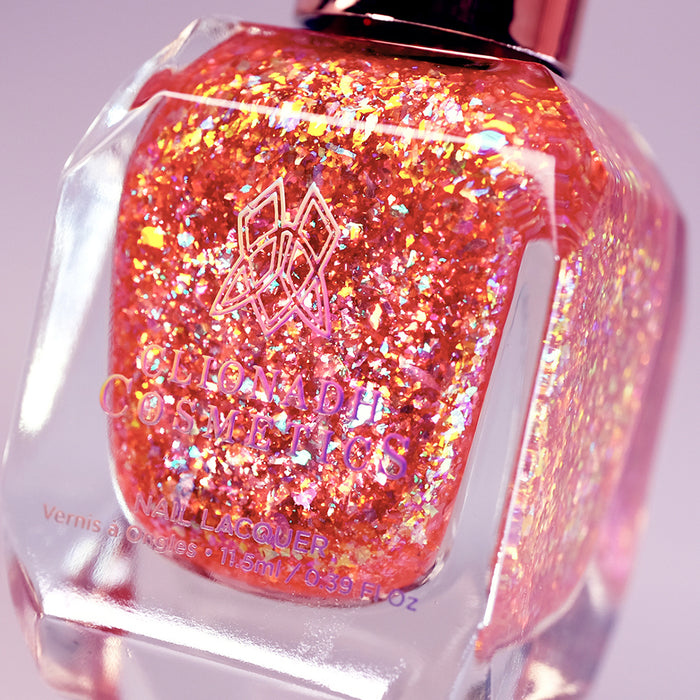 Angled, close-up of Apple Picking Nail Lacquer bottle on a white background.