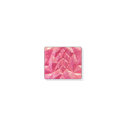 A single multichrome eyeshadow in colour Baroness on a white background. A salmon pink base with large particles that shift bright pink-peach-chartreuse.