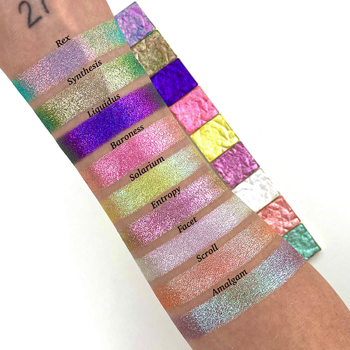 Arm swatches of the Halloween Stained Glass Expansion Bundle shadows on fair skin tone, on a white background. Single shadows in background.