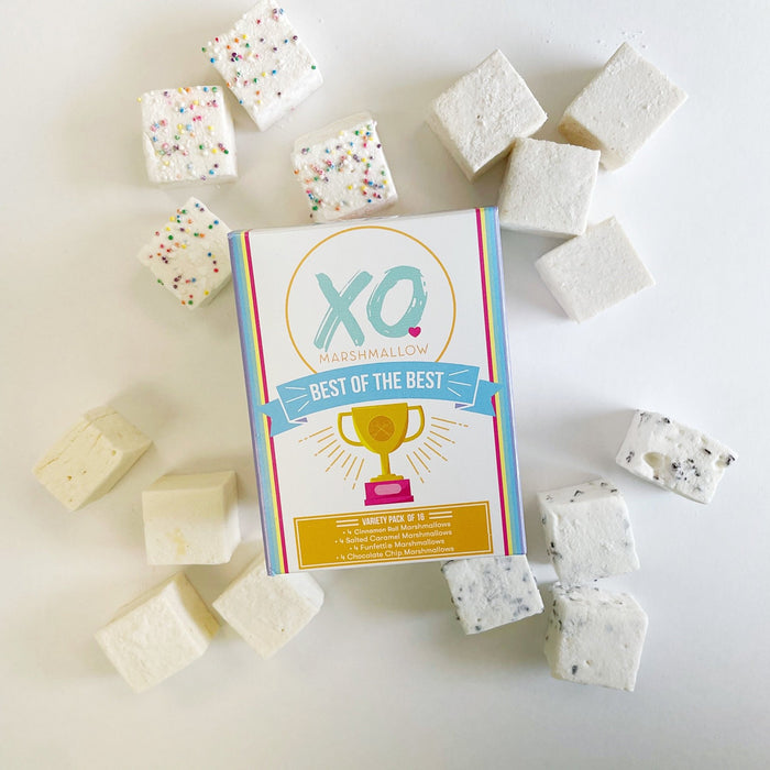 A variety of marshmallows including cinnamon roll, chocolate chip, salted caramel, and funfetti flavors, displayed around the packaging that reads 'XO Marshmallow' with a title 'Best of the Best'.
