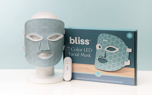 Bliss 7-Color LED Facial Mask with packaging on a light blue background