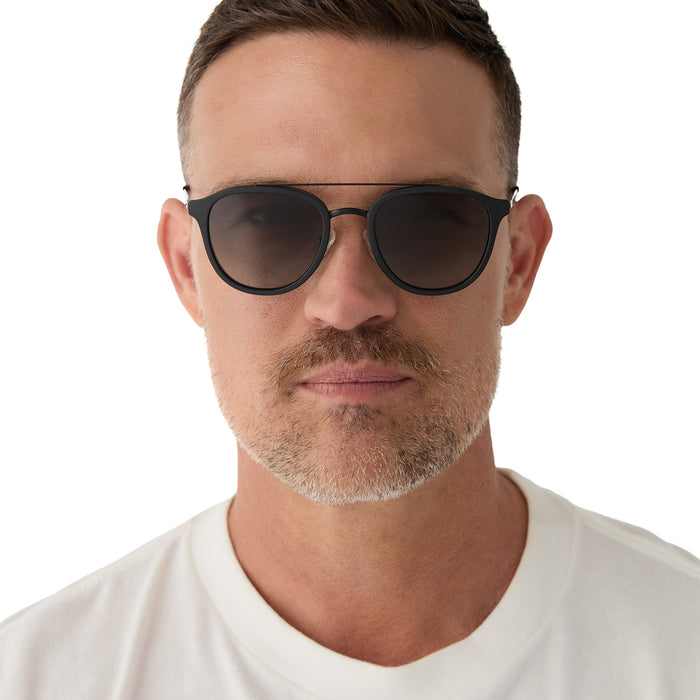 on model - male wearing diff eyewear camden matte black grey gradient polarized sunglasses front view
