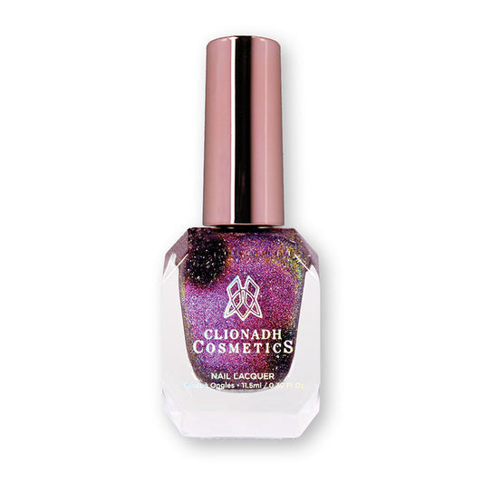 Bottle of nail polish containing Cosmic Cling nail lacquer on a white background.