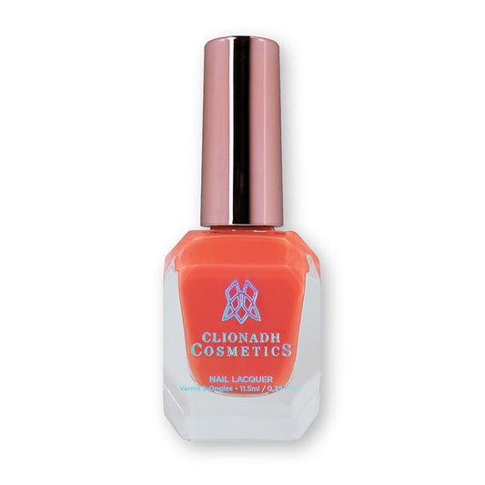 Bottle of nail polish containing Elated Nail Lacquer on white background.
