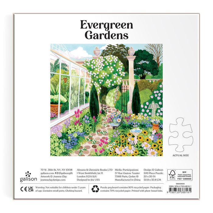 Illustration from Joanna Clay’s Evergreen Gardens 500 Piece Puzzle: a lush garden with colorful flowers, shrubs, tall trees, a glass greenhouse, and stone path under blue sky with decorative pillars in the background.