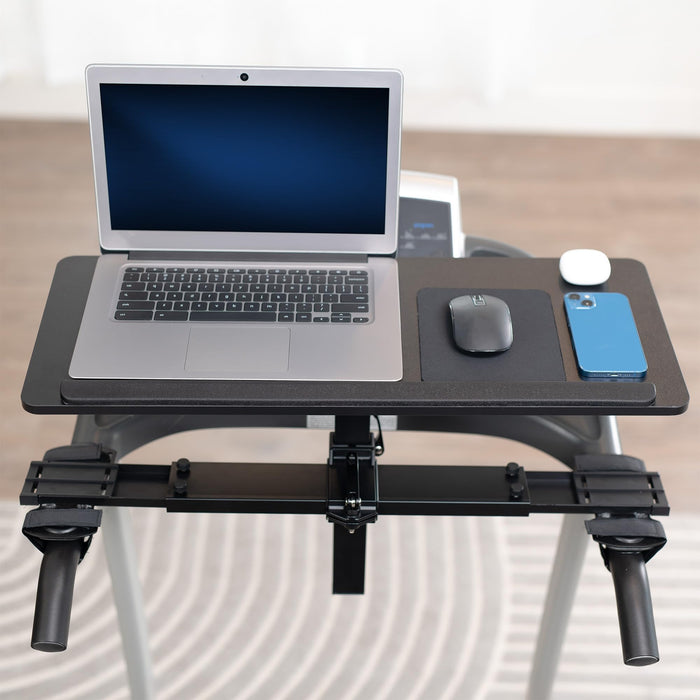 Portable 27" Laptop Desk for Treadmills with laptop, mouse, and phone on a light background