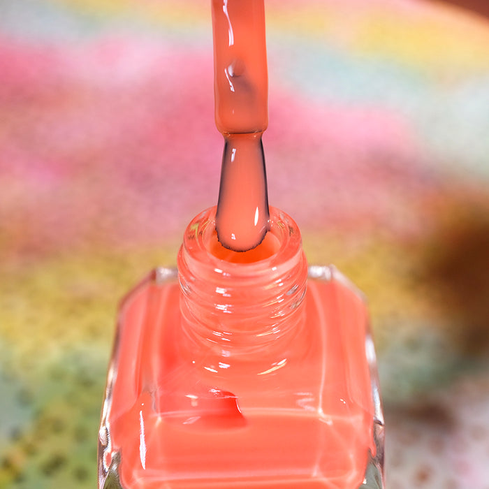 Close-up of opened nail polish bottle containing Horizon Nail Lacquer, with brush showing.
