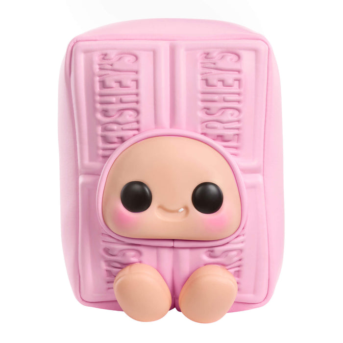 Pink toy shaped like a Hershey's bar with a face on a white background
