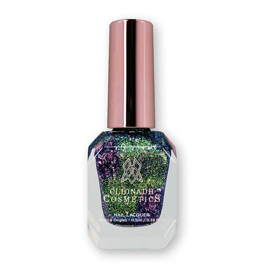Bottle of nail polish containing Inocybe Nail lacquer on a white background.