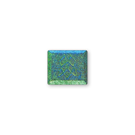 A single multichrome eyeshadow in colour Kelp Forest on a white background. A deep, cool brown base with green-turquoise-blue-indigo shifts.