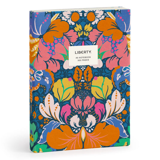 The Liberty London Glastonbury Premium A5 Notebook features a vibrant floral cover in orange, blue, pink, and green with a front white Liberty label and includes 300 pages.