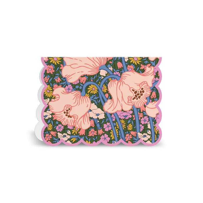 The Liberty Premium Notecard Set by Liberty London features a scalloped-edged card with a pink border, adorned with large pink poppies and small floral accents on a dark background.