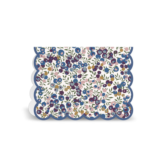 The Liberty Premium Notecard Set by Liberty London features floral-patterned notecards with blue, purple, and pink flowers, green leaves, and a blue scalloped border, shown upright against a white background.