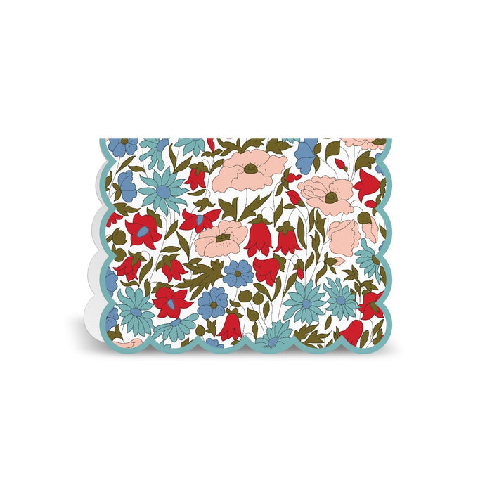 The Liberty London Liberty Premium Notecard Set features scalloped-edge cards adorned with vibrant red, blue, pink, and white florals and green leaves on a white background.