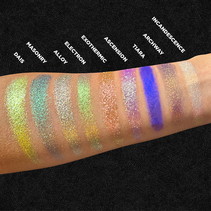 Arm swatches of Masonry and the rest of the Stained Glass Expansion Bundle on medium skin tone, on a black background.