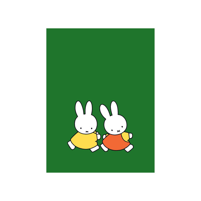 Two white cartoon bunnies with black features, one in a yellow dress and one in orange, run hand in hand on a solid green background. Featured on the Miffy Postcard Sticker Book by Miffy.