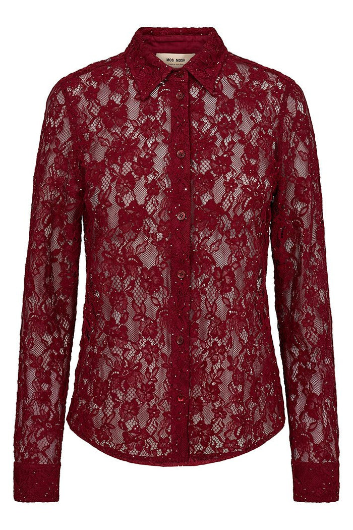 Red lace blouse on a white background