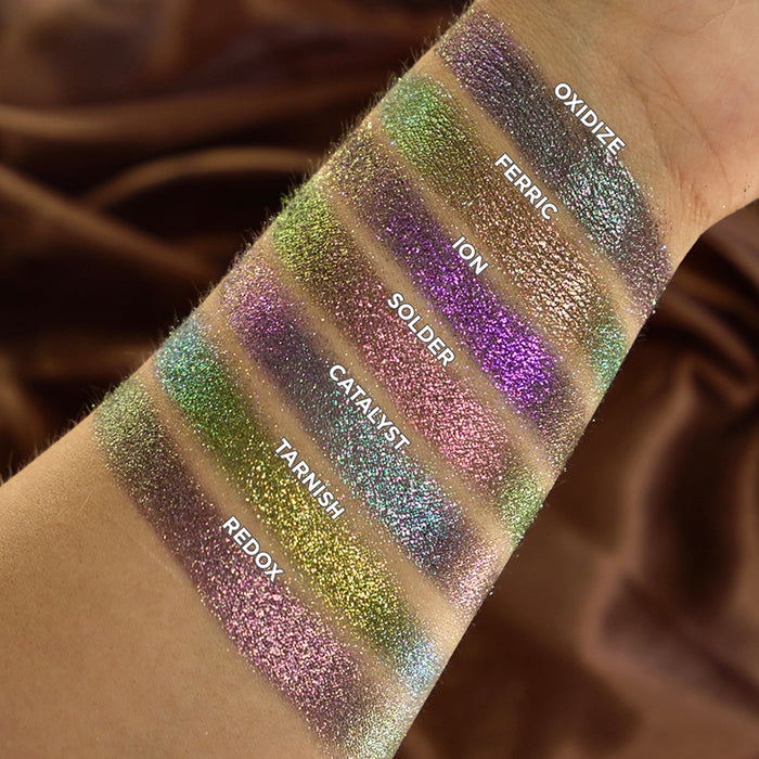 Arm swatches of Ferric, Tarnish, Solder, Redox, Oxidize, Catalyst and Ion on fair skin tone.
