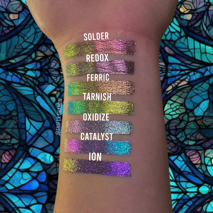 Arm swatches of Ferric, Tarnish, Solder, Redox, Oxidize, Catalyst and Ion on fair skin tone.