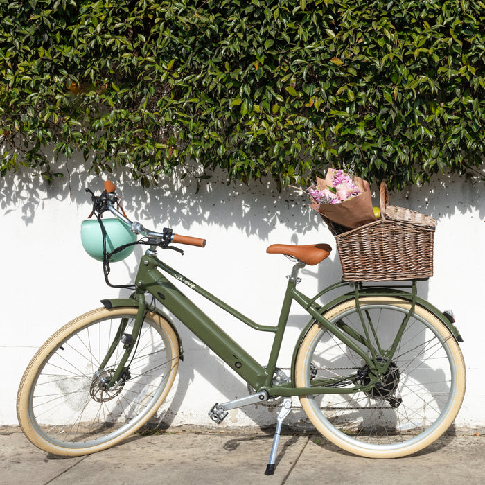 Bluejay Premiere Edition e-bike in Olive Green with helmet and basket
