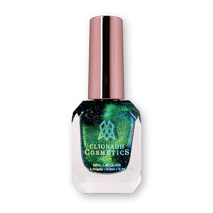 Bottle of nail polish containing Planetary Attraction on a white background.