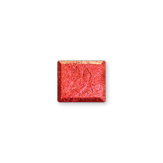 A single multichrome eyeshadow in colour Ring of Fire on a white background. A large particle glitter shadow with red sparkles that shift red-orange-peach-yellow.