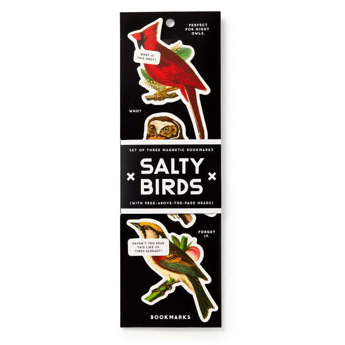 The Brass Monkey Salty Birds Magnetic Bookmark Set features three quirky bird bookmarks—a talking red cardinal, an owl, and a witty bird—packaged in sleek black as the perfect reading accessory.