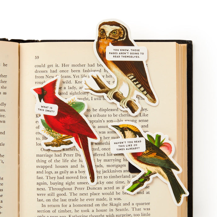 The Brass Monkey Salty Birds Magnetic Bookmark Set features three illustrated bird bookmarks with speech bubbles, adding a quirky and humorous touch to your reading.