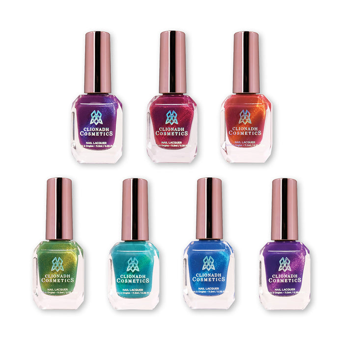 Seven bottles of nail polish containing colours from the Saturated Slick Collection, on a white background.