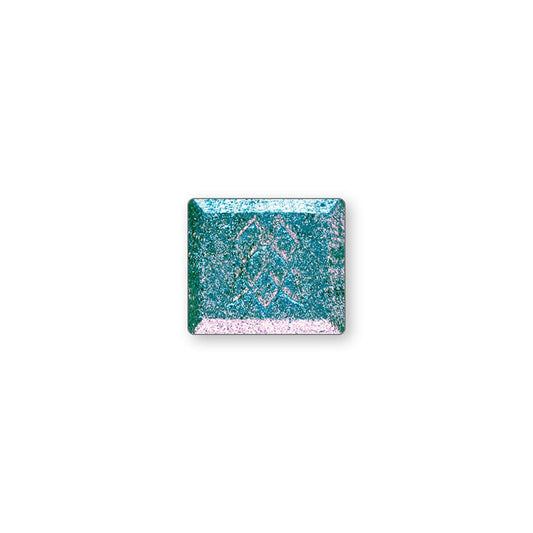 A single multichrome eyeshadow in colour The Bends on a white background.A rich teal base with large glitter particles shifting lilac-beige-yellow with hints of lime.
