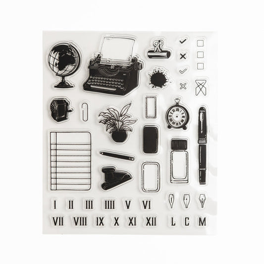Clear acrylic stamp sheet with typewriter, desk items, and planning-themed illustrations.