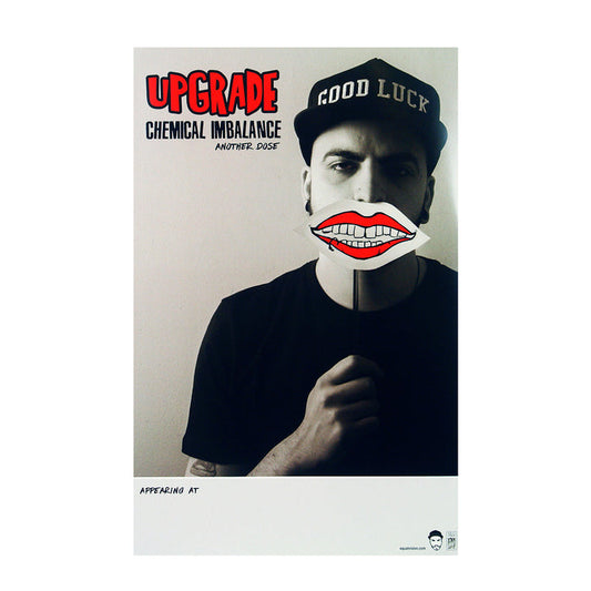 A black and white poster has an image of a man holding up a piece of paper with a girl's smile on it to his mouth. His black hat says "good luck" on it and "upgrade" is on the poster in red letters, along with the words "chemical imbalance" and "another dose" in black letters.
