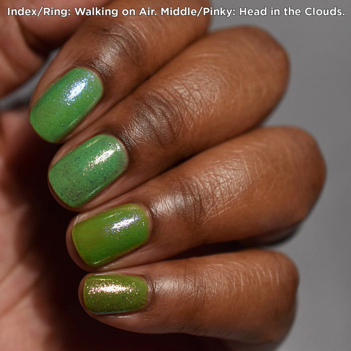 Close-up of nails painted with Walking on Air Nail Lacquer on deep skin tone.