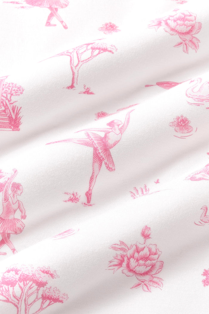 Close up of the bamboo fabric: A dusty rose toile print on a white background, featuring ballet dancers in tutus, small gazebos with stairs, water lilies on lily pads, reeds, rowboats, trees, swans, cygnets, and flowers.